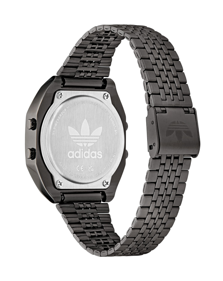 Black Adidas watch with metal strap on a white background
