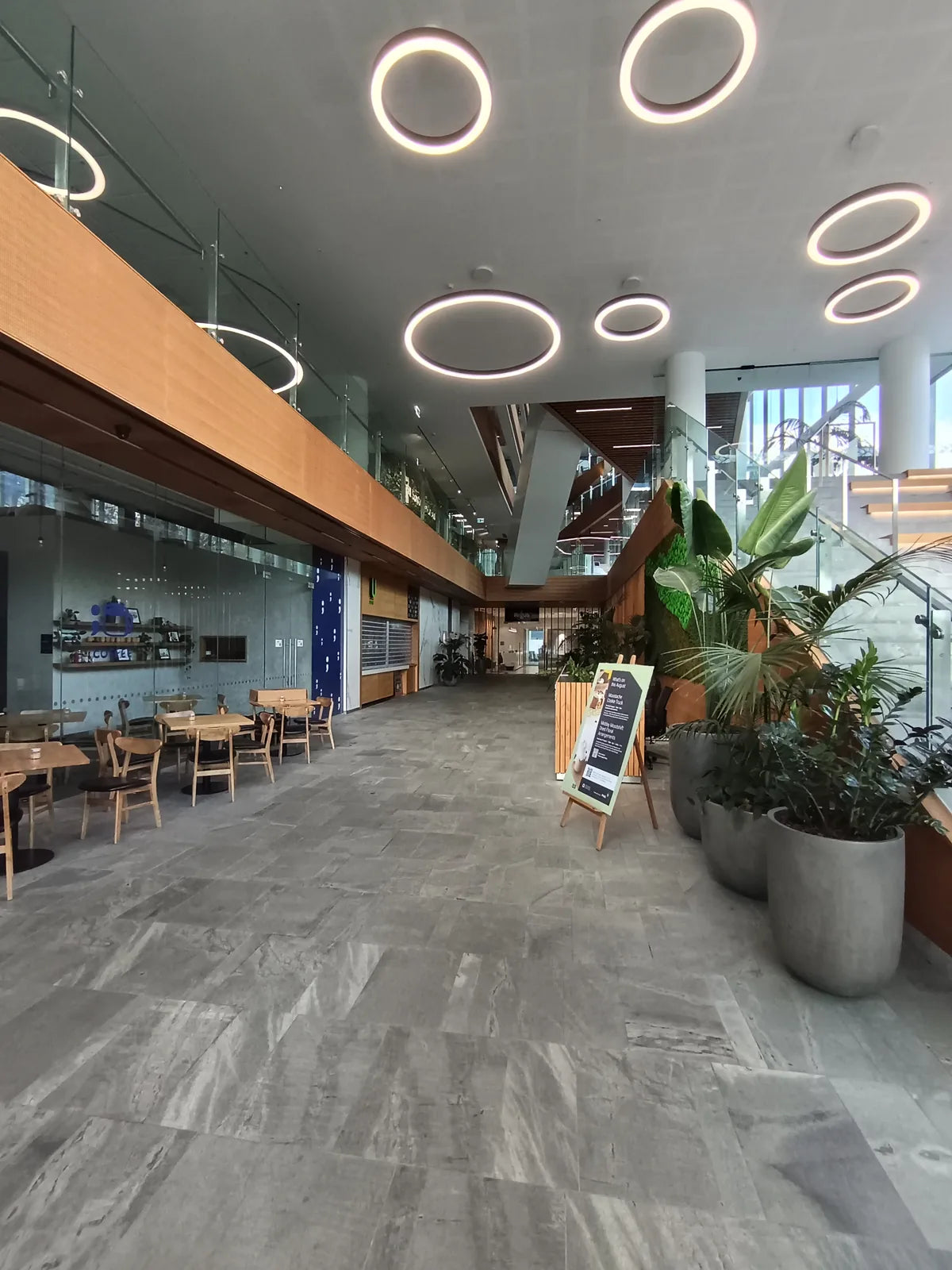 Ground-floor lobby leading toward Regus reception